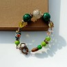 Bracelet Viviane vert et ses perles de bois de palmier